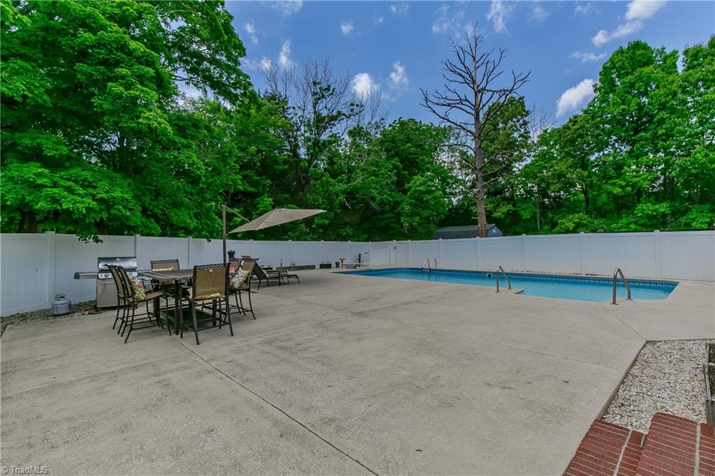 1336 A Townbranch Road Graham, NC 27253 - Photo 8 of 36 Gleaming pool with diving board has an 8 ft deep end!