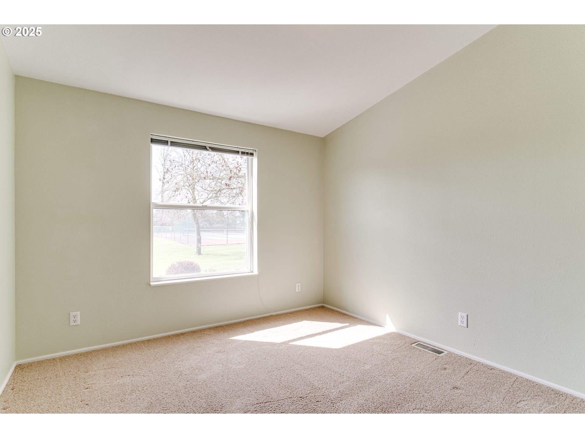 5353 Club Drive Eugene, OR 97402 - Photo 11 of 34 an empty room with windows