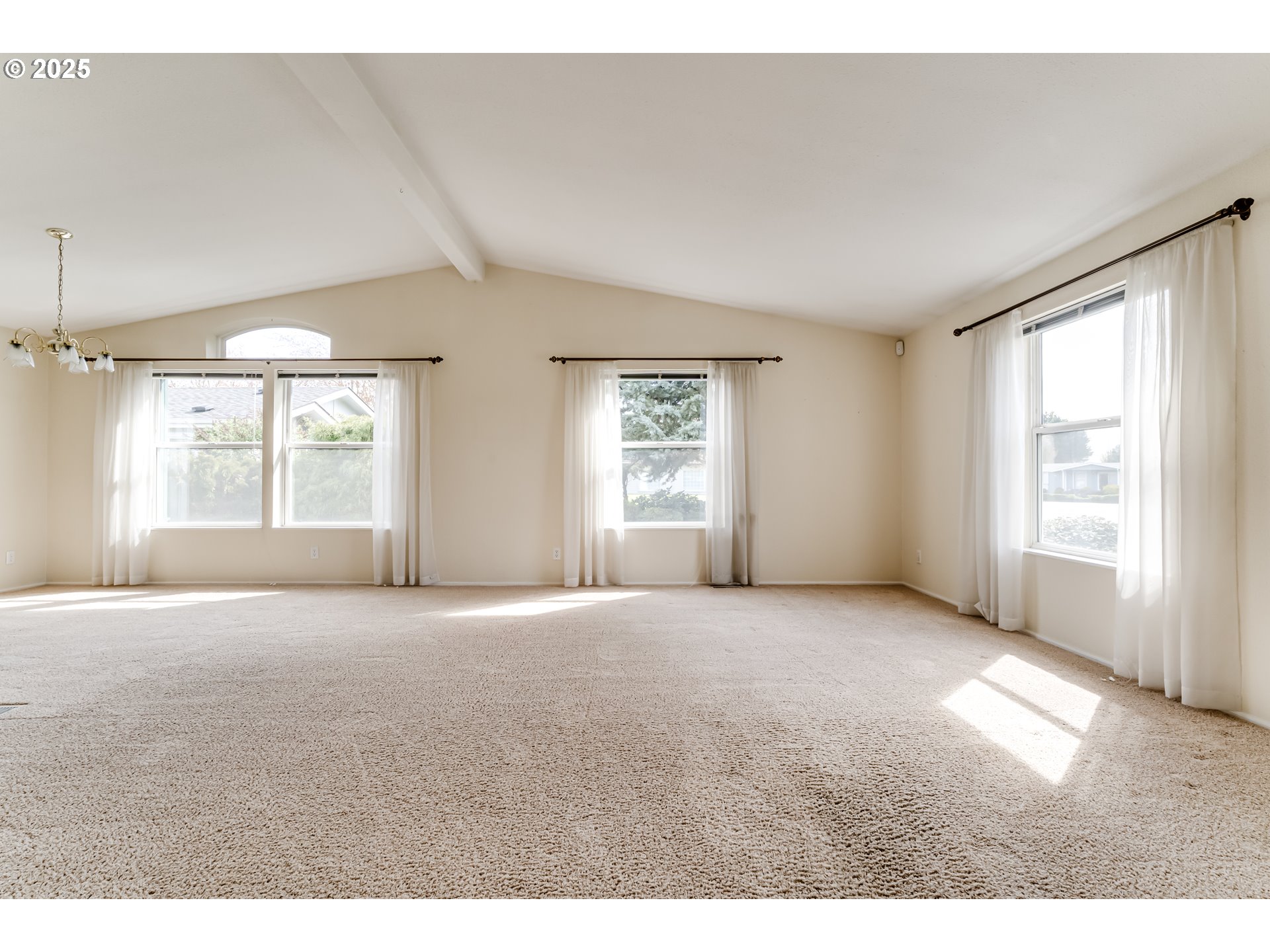 5353 Club Drive Eugene, OR 97402 - Photo 3 of 34 a view of an empty room with a window