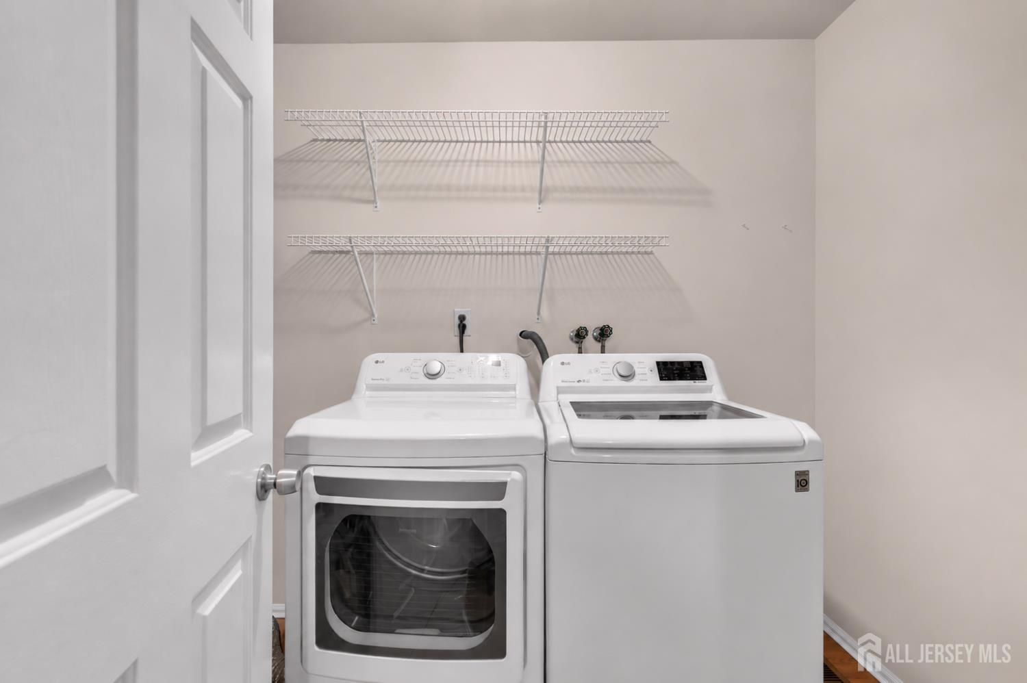 91 Delaware Lane Somerville, NJ 08876 - Photo 15 of 33 a utility room with dryer and washer