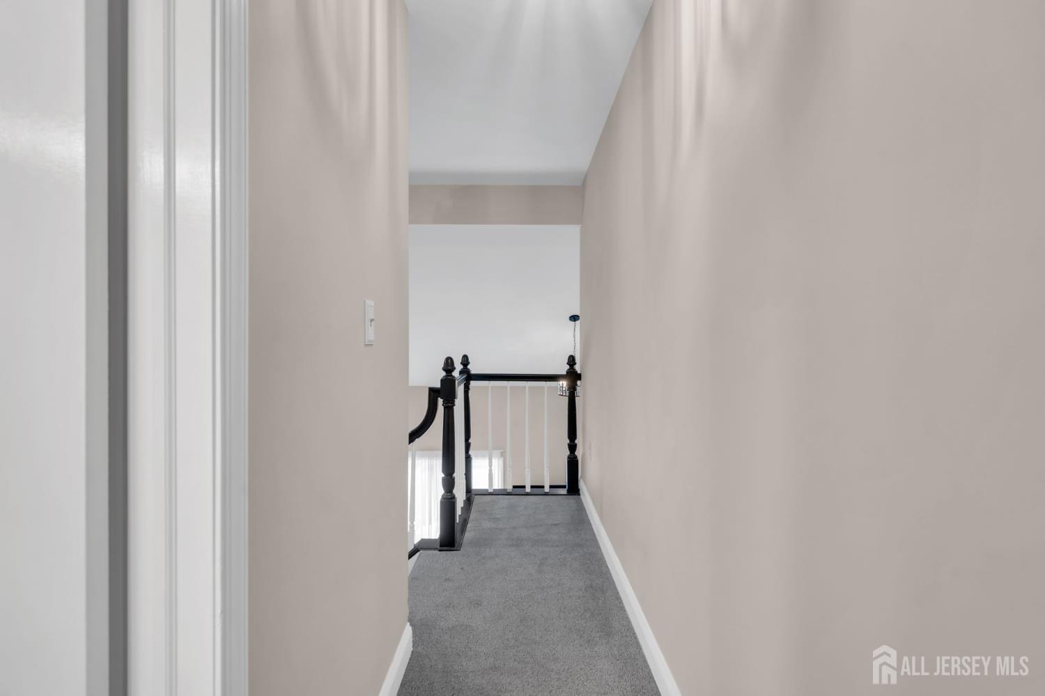 91 Delaware Lane Somerville, NJ 08876 - Photo 16 of 33 a view of a hallway with a white walls