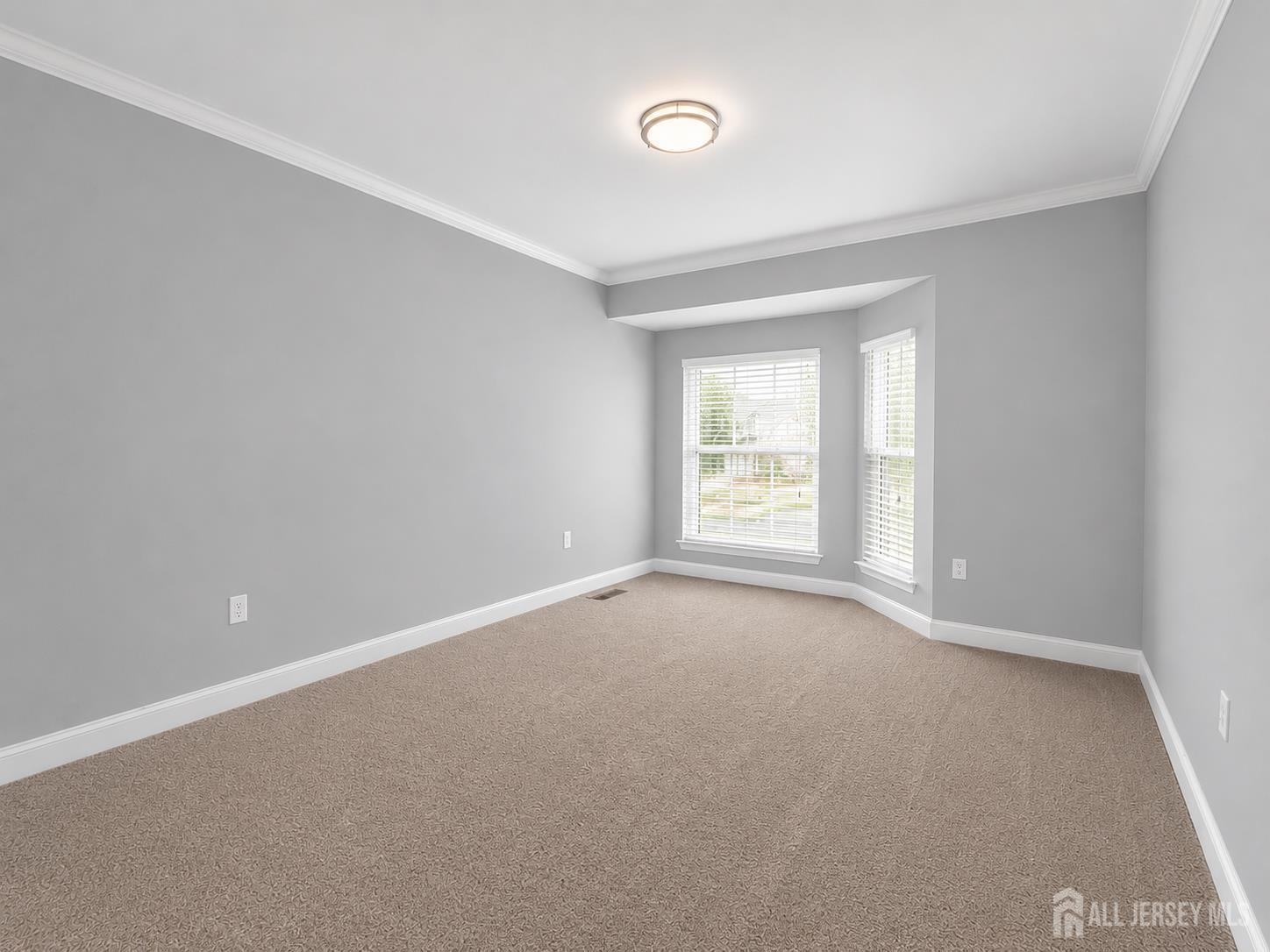 91 Delaware Lane Somerville, NJ 08876 - Photo 22 of 33 a view of an empty room with a window