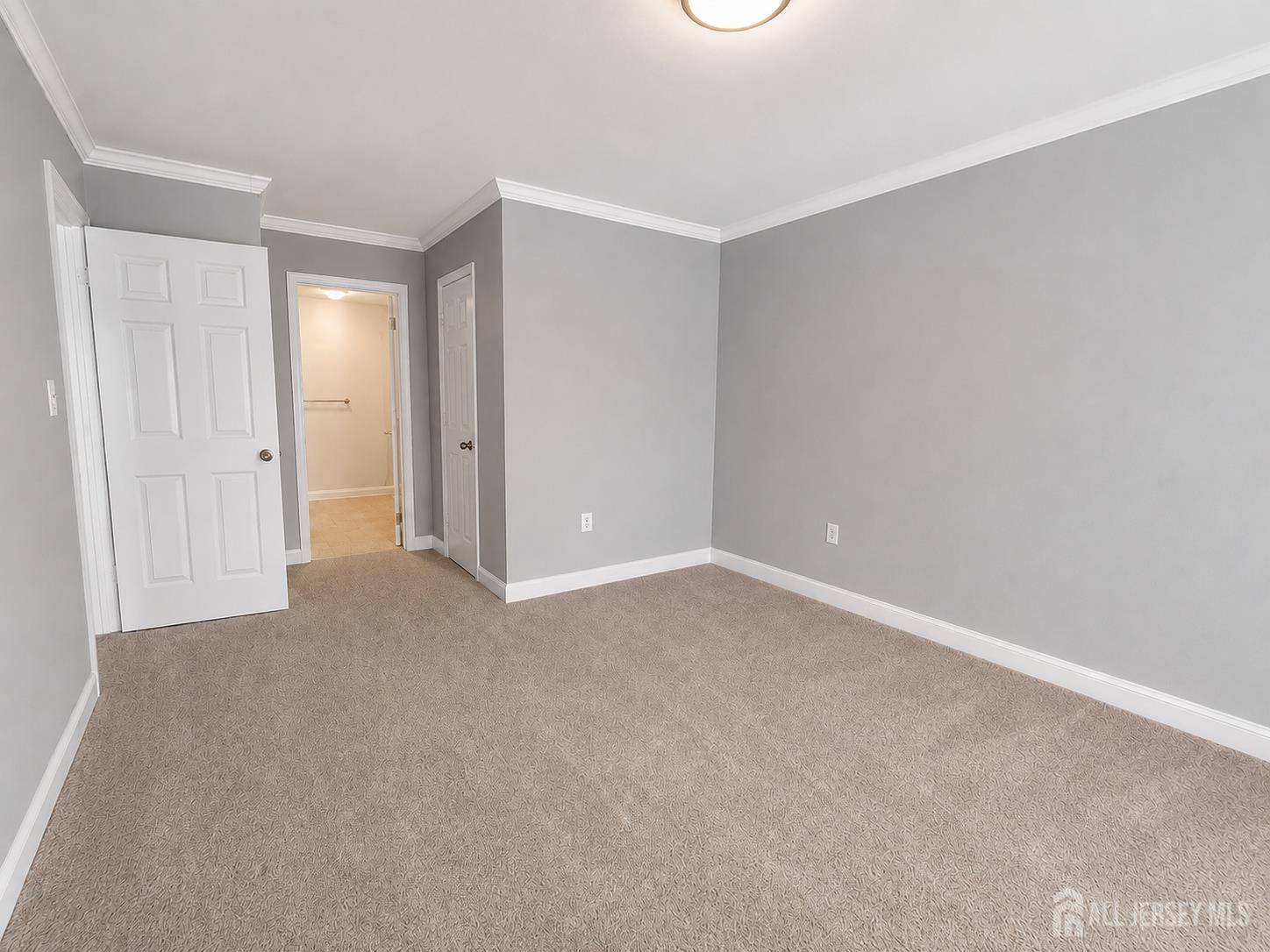 91 Delaware Lane Somerville, NJ 08876 - Photo 23 of 33 a view of an empty room and closet area
