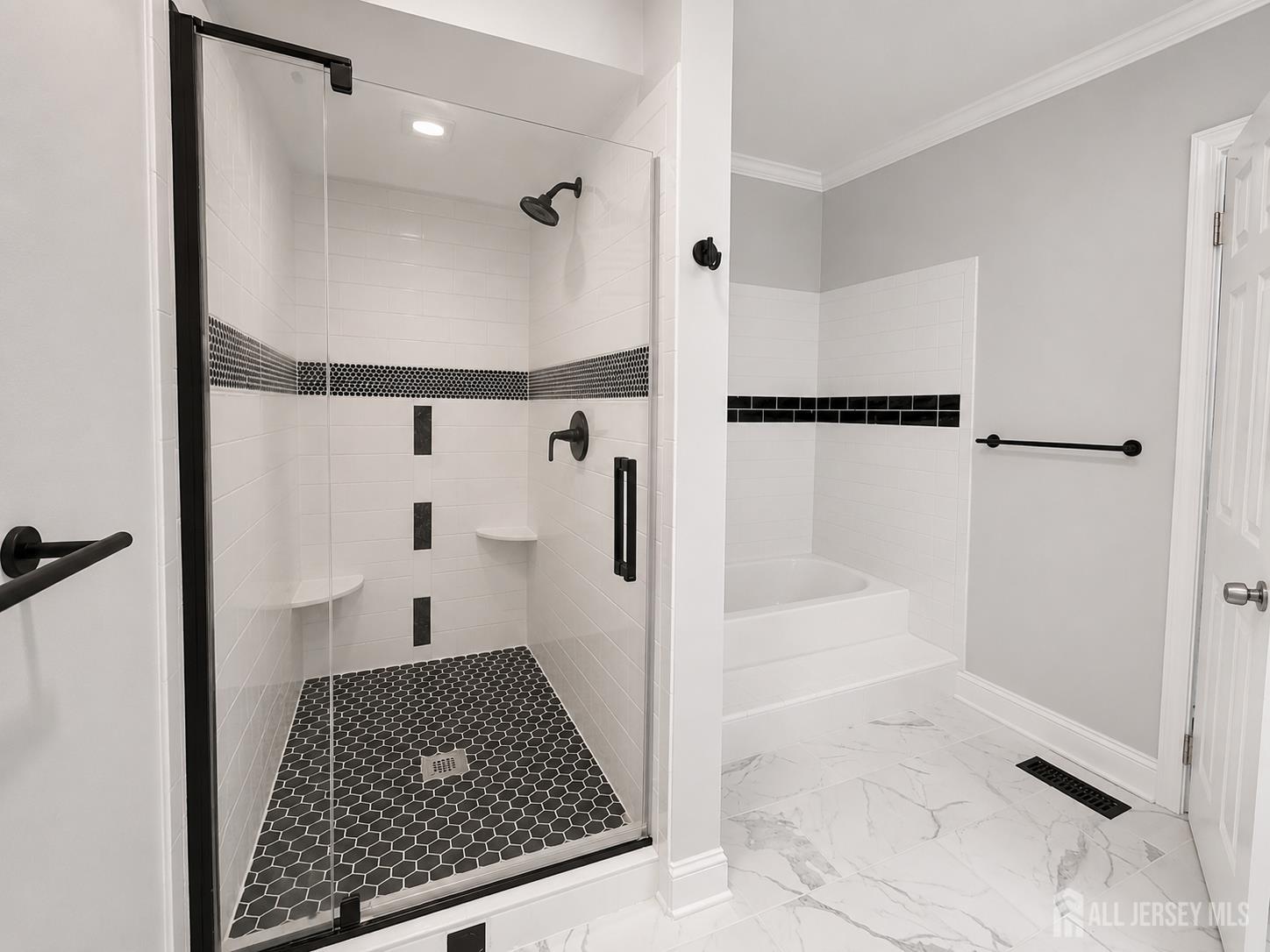 91 Delaware Lane Somerville, NJ 08876 - Photo 25 of 33 a bathroom with a bathtub and a shower