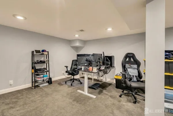 a view of a workspace with furniture