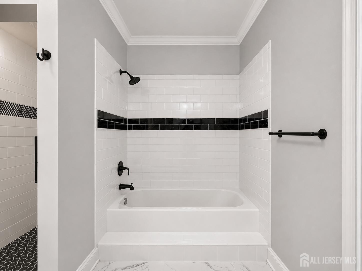 91 Delaware Lane Somerville, NJ 08876 - Photo 27 of 33 a bathroom with a shower and a bath tub