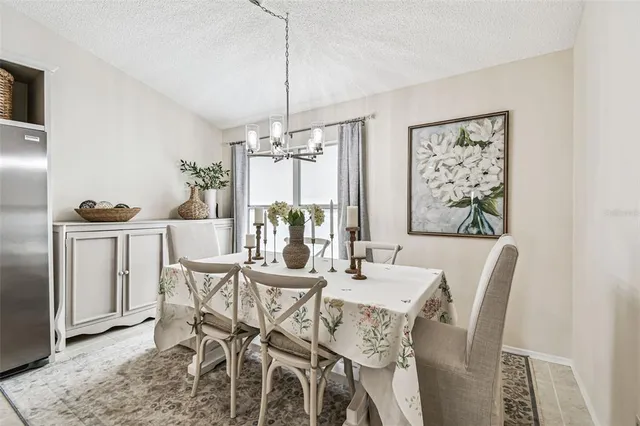 a view of dining table and chandelier