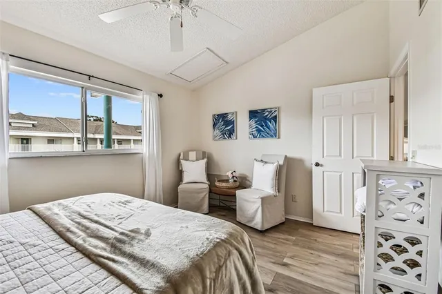a bathroom with a sink vanity mirror and toilet