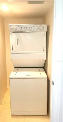 a view of car parked in front of a building