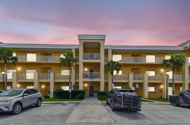 a view of a building with sitting area