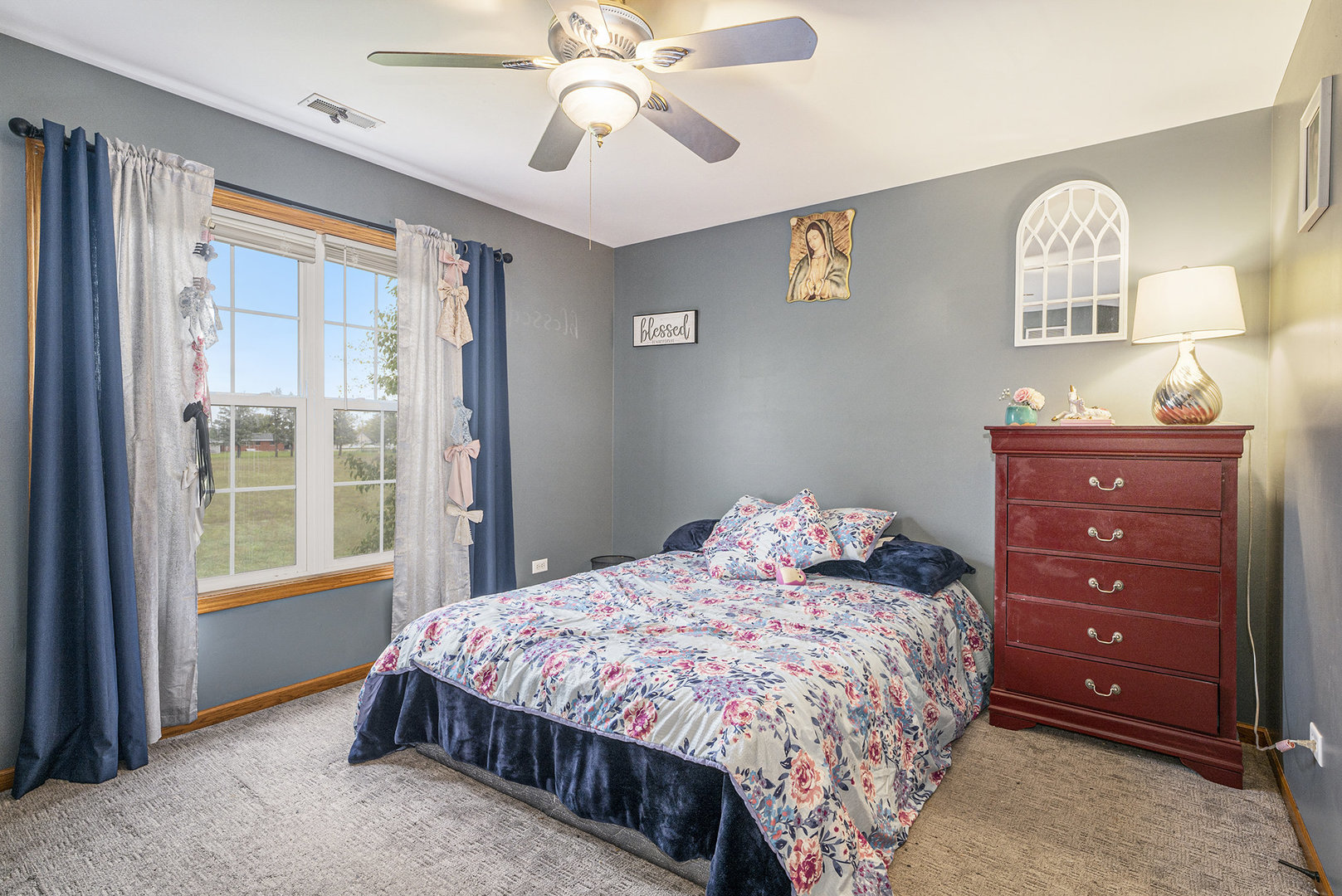 257 Pine Street Beecher, IL 60401 - Photo 16 of 31 a bedroom with a bed and a dresser