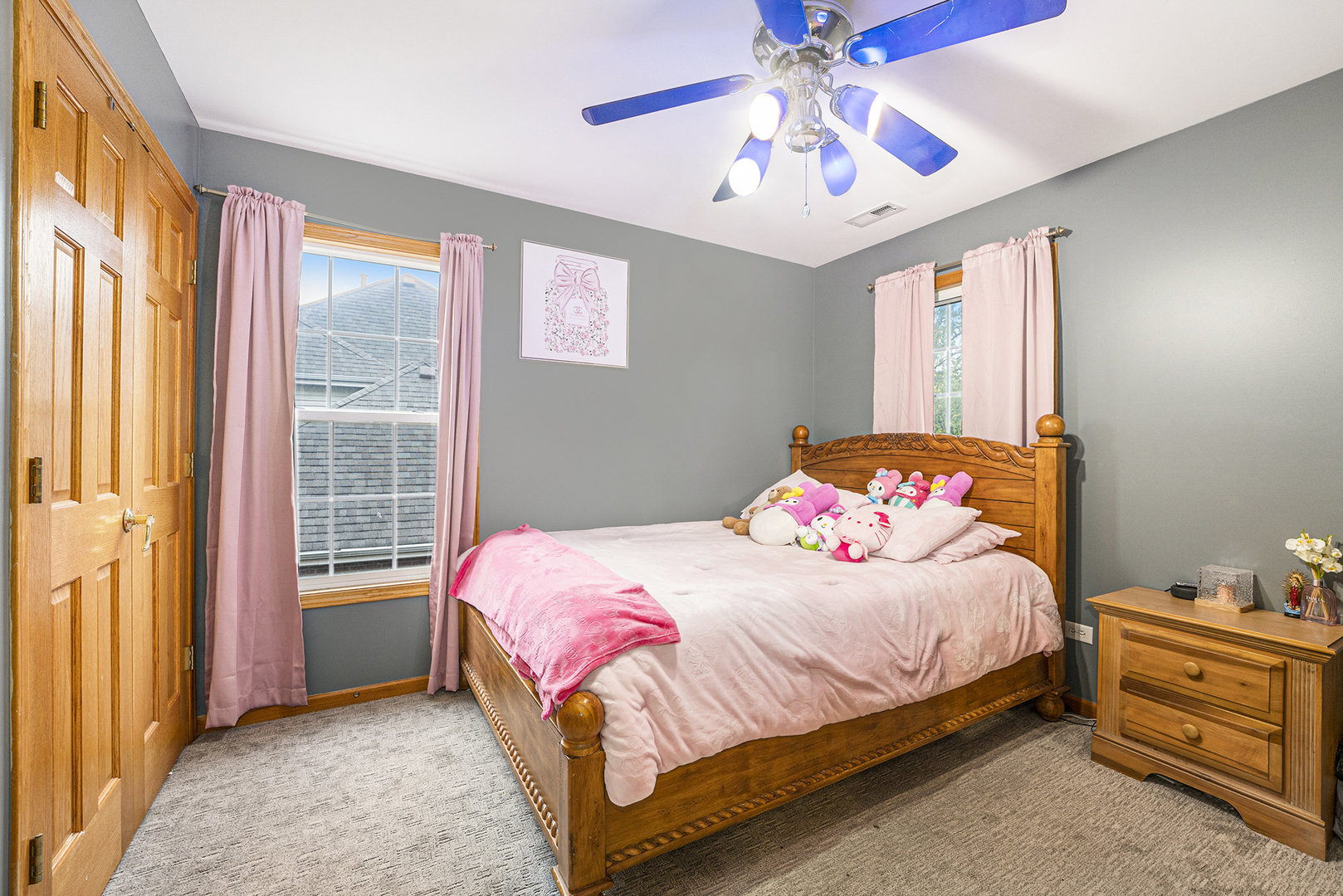 257 Pine Street Beecher, IL 60401 - Photo 18 of 31 a bedroom with a bed and a chandelier