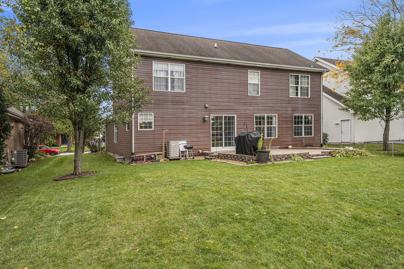 257 Pine Street Beecher, IL 60401 - Photo 29 of 31 a view of a house with a backyard