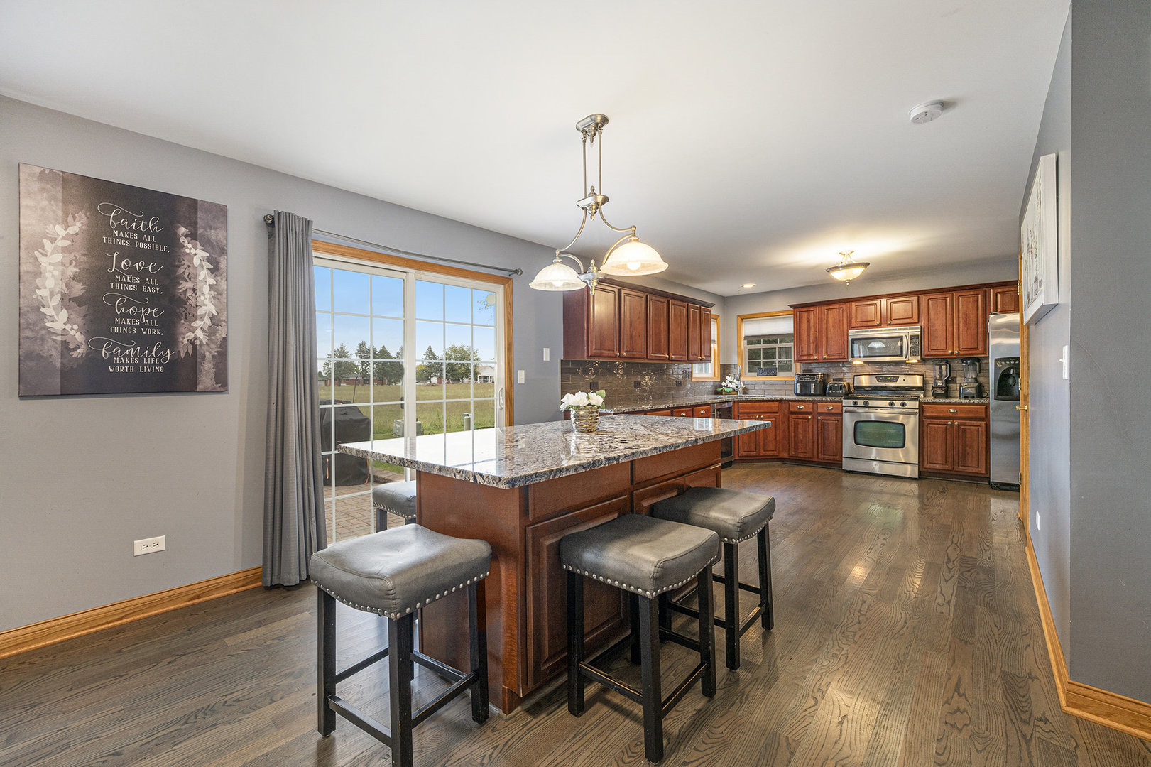 257 Pine Street Beecher, IL 60401 - Photo 5 of 31 a dining room with furniture and wooden floor