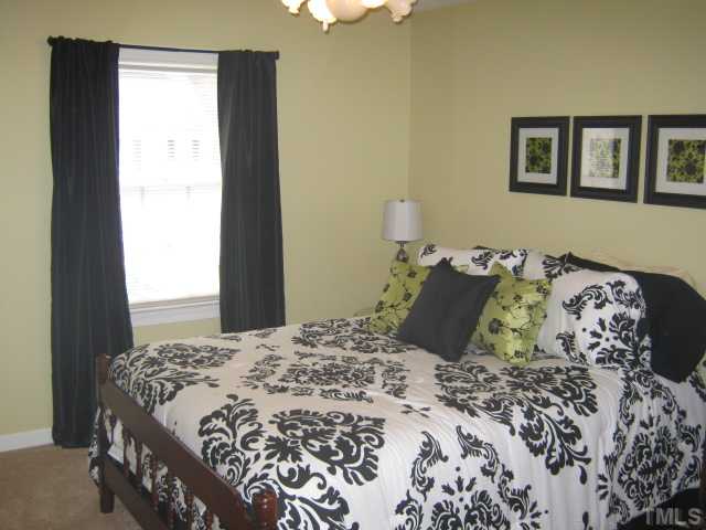 9117 Doublebit Drive Raleigh, NC 27615 - Photo 10 of 12 Lovely secondary bedroom is as tastefully done as every other room in this fantastic home! Phone and cable ready! Secondary bedrooms in your new home are sized nicely to accomodate your furniture and not leave you feeling shy of space!