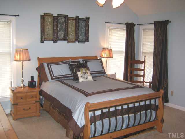 9117 Doublebit Drive Raleigh, NC 27615 - Photo 9 of 12 Nice sized master bedroom will accomodate your bedroom furniture nicely. This will be your relaxing sanctuary to come to! Room features vaulted ceilings and a ceiling fan!