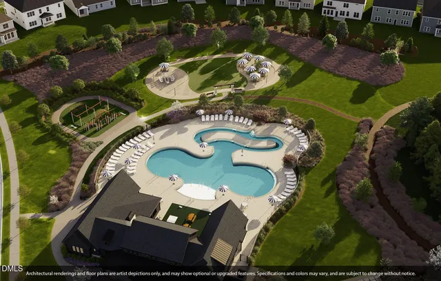 a backyard of a house with lots of green space and plants