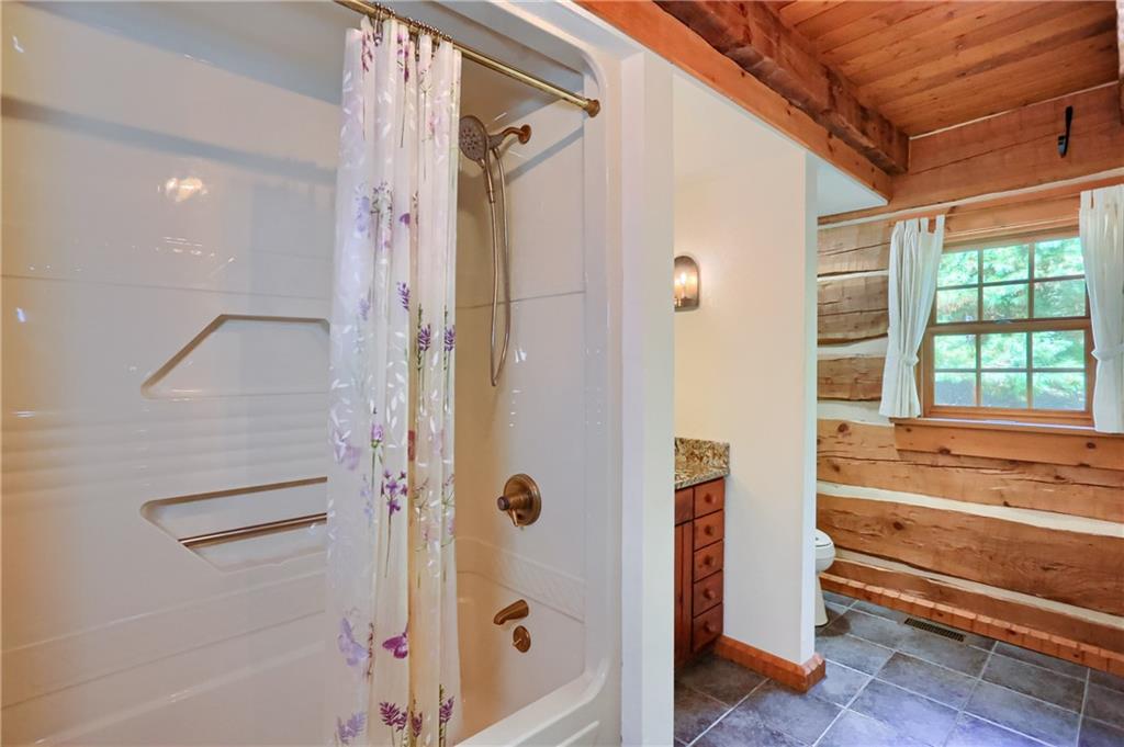 135 Mekis Road Valencia, PA 16059 - Photo 19 of 49 a bathroom with a bathtub and a shower
