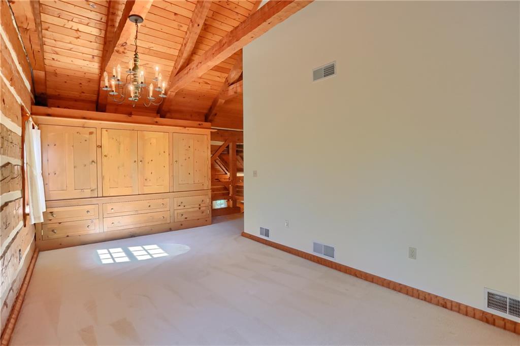 135 Mekis Road Valencia, PA 16059 - Photo 23 of 49 a view of a garage with wooden walls