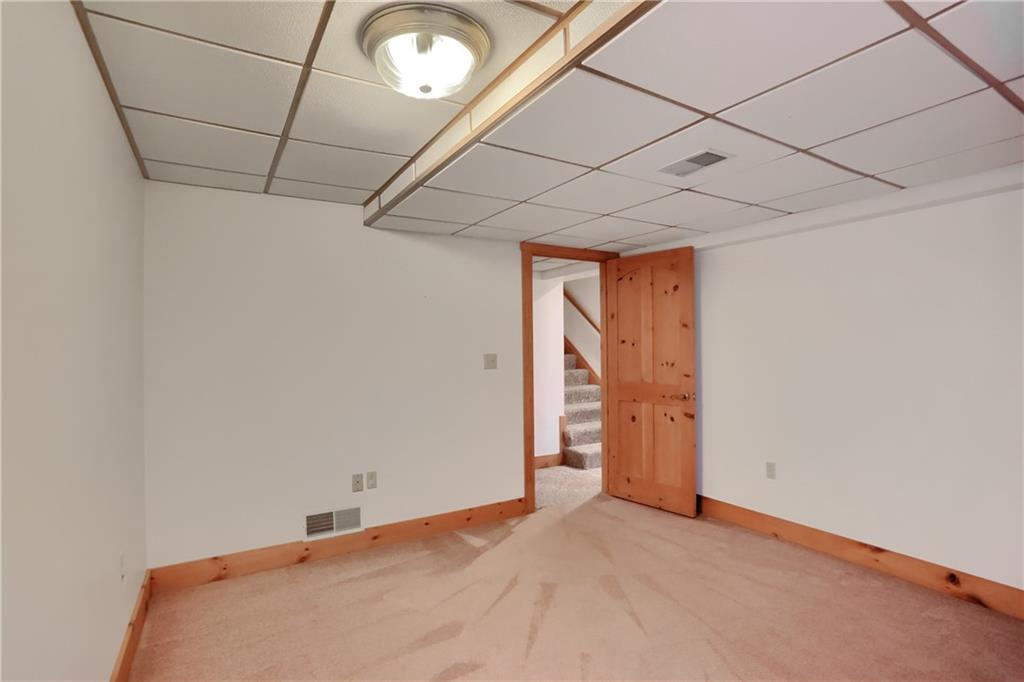 135 Mekis Road Valencia, PA 16059 - Photo 28 of 49 a view of empty room with wooden floor