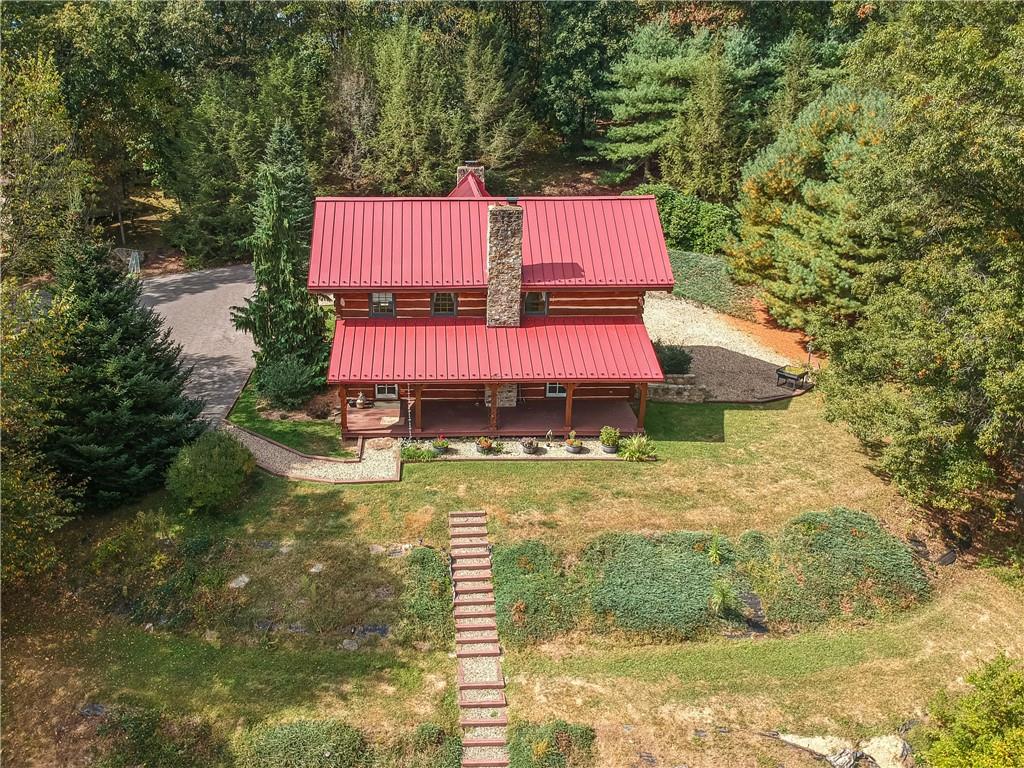 135 Mekis Road Valencia, PA 16059 - Photo 3 of 49 a view of a wooden floor with a swimming pool