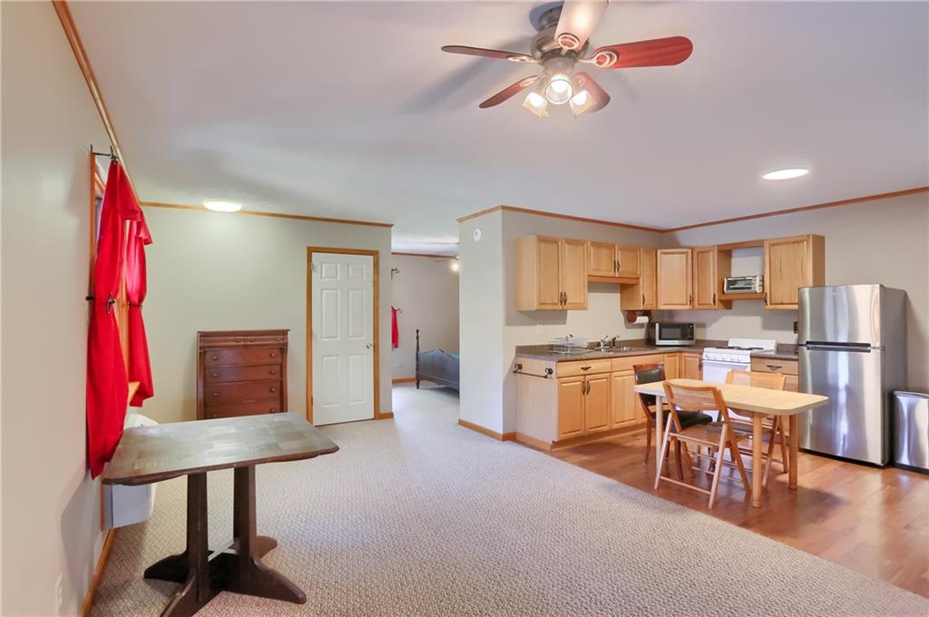 135 Mekis Road Valencia, PA 16059 - Photo 45 of 49 a view of a dining room with furniture window and wooden floor