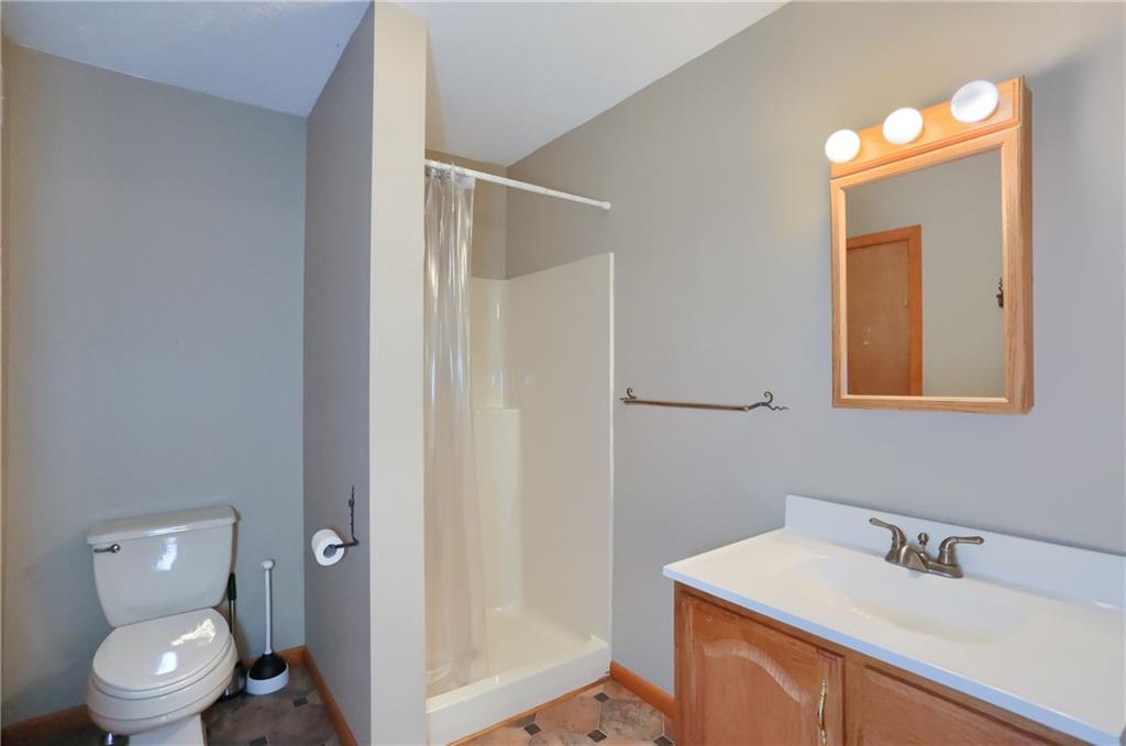 135 Mekis Road Valencia, PA 16059 - Photo 47 of 49 a bathroom with a toilet sink and mirror