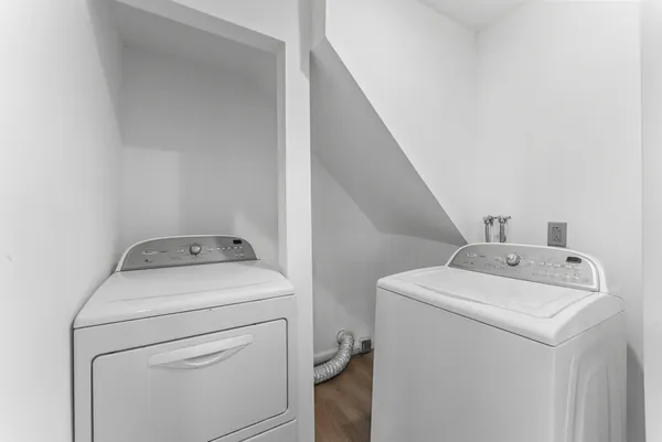 a utility room with dryer and washer