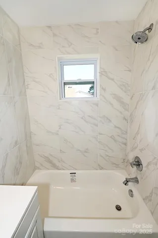 a bathroom with a bathtub