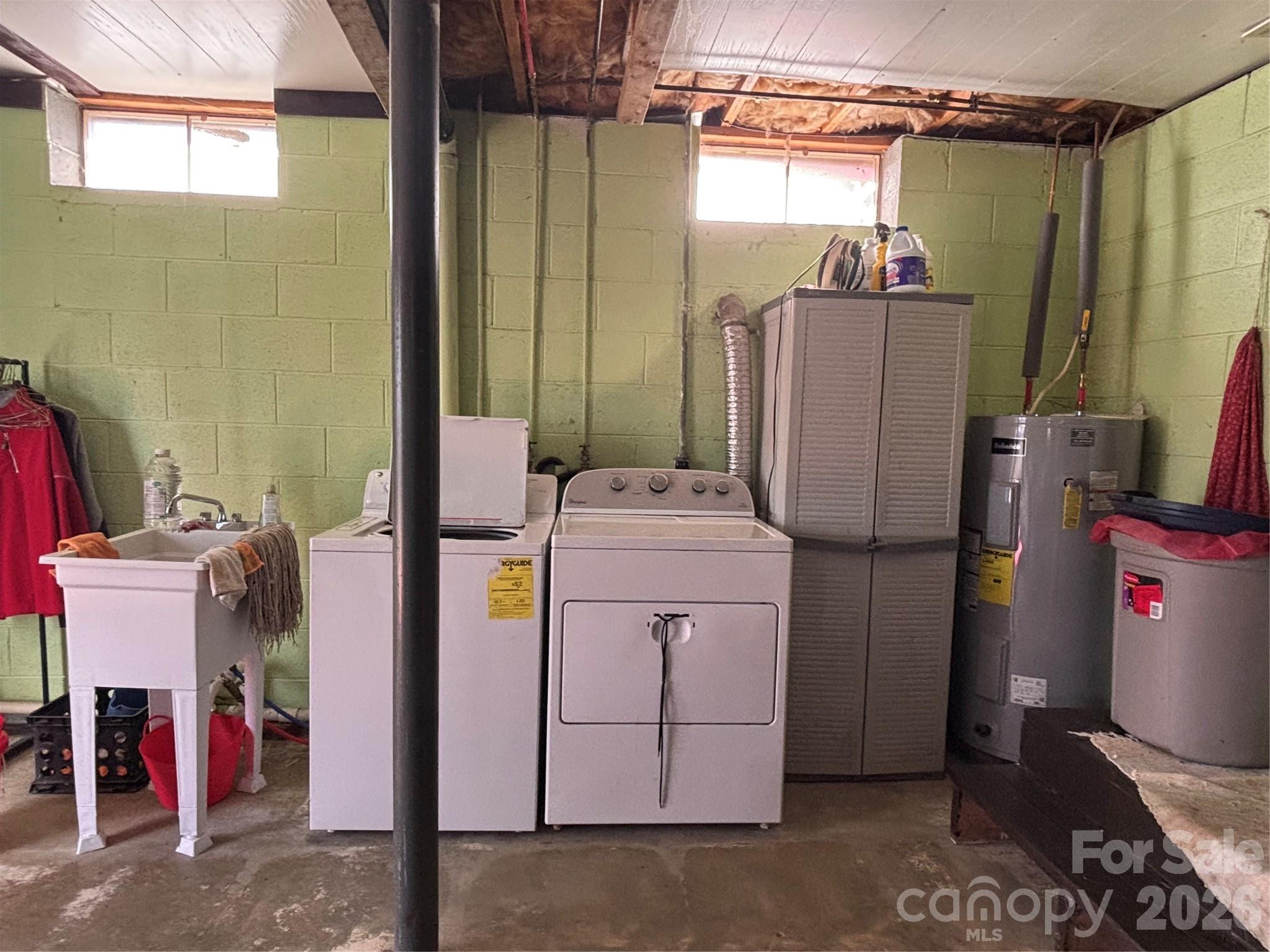 493 Franklintown Road Spruce Pine, NC 28777 - Photo 12 of 27 a utility room with dryer and washer