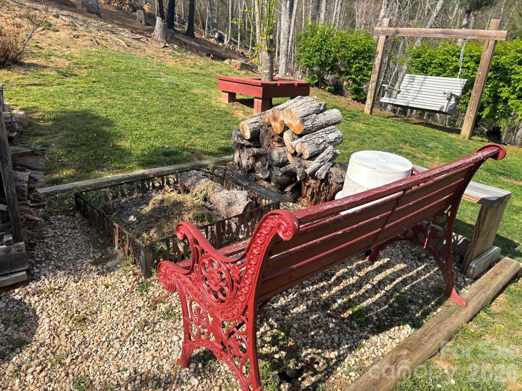 493 Franklintown Road Spruce Pine, NC 28777 - Photo 17 of 27 a view of a backyard with sitting area