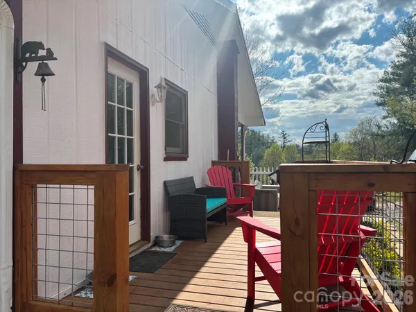 a view of a balcony with furniture
