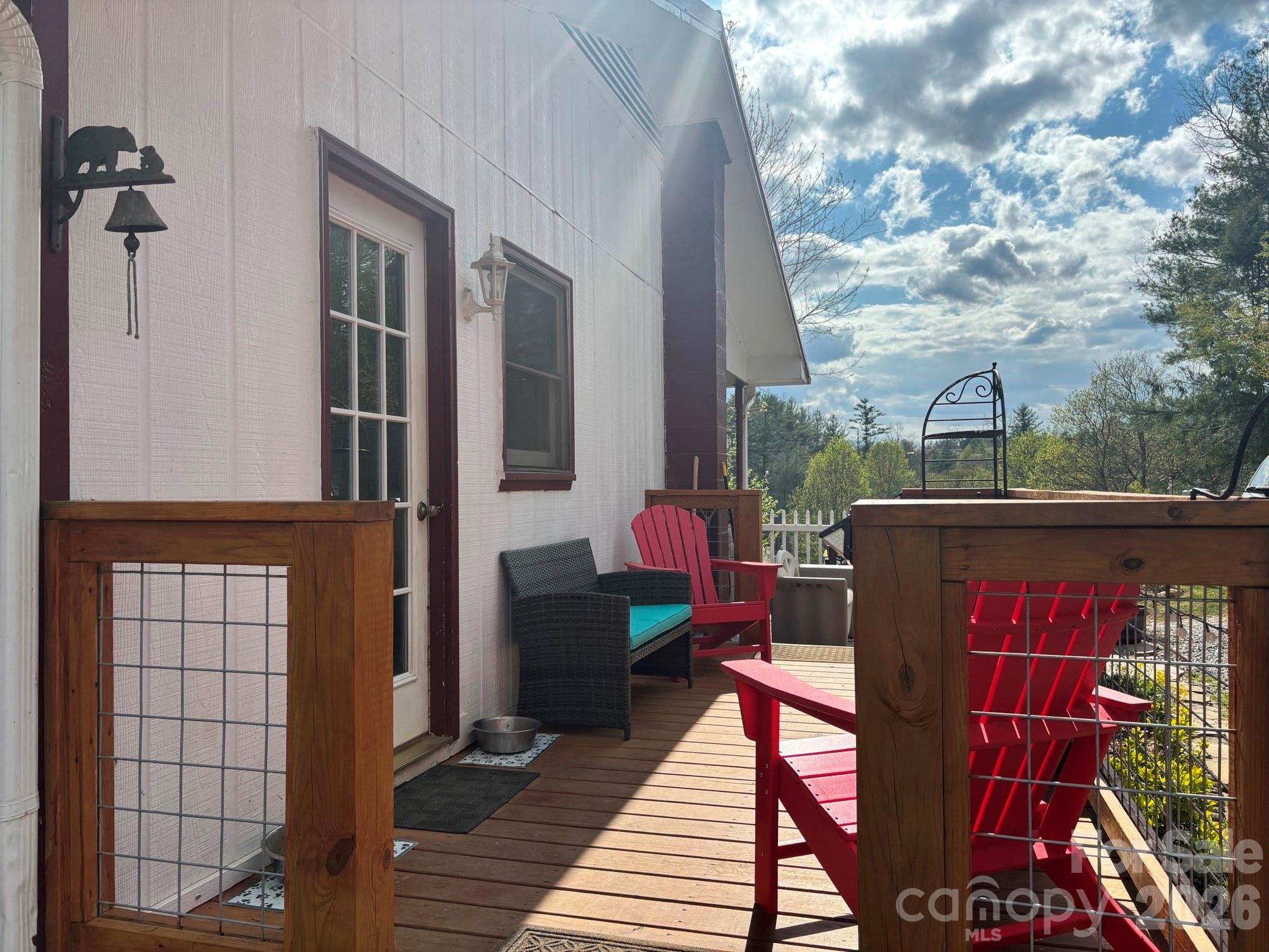 493 Franklintown Road Spruce Pine, NC 28777 - Photo 19 of 27 a view of a balcony with furniture