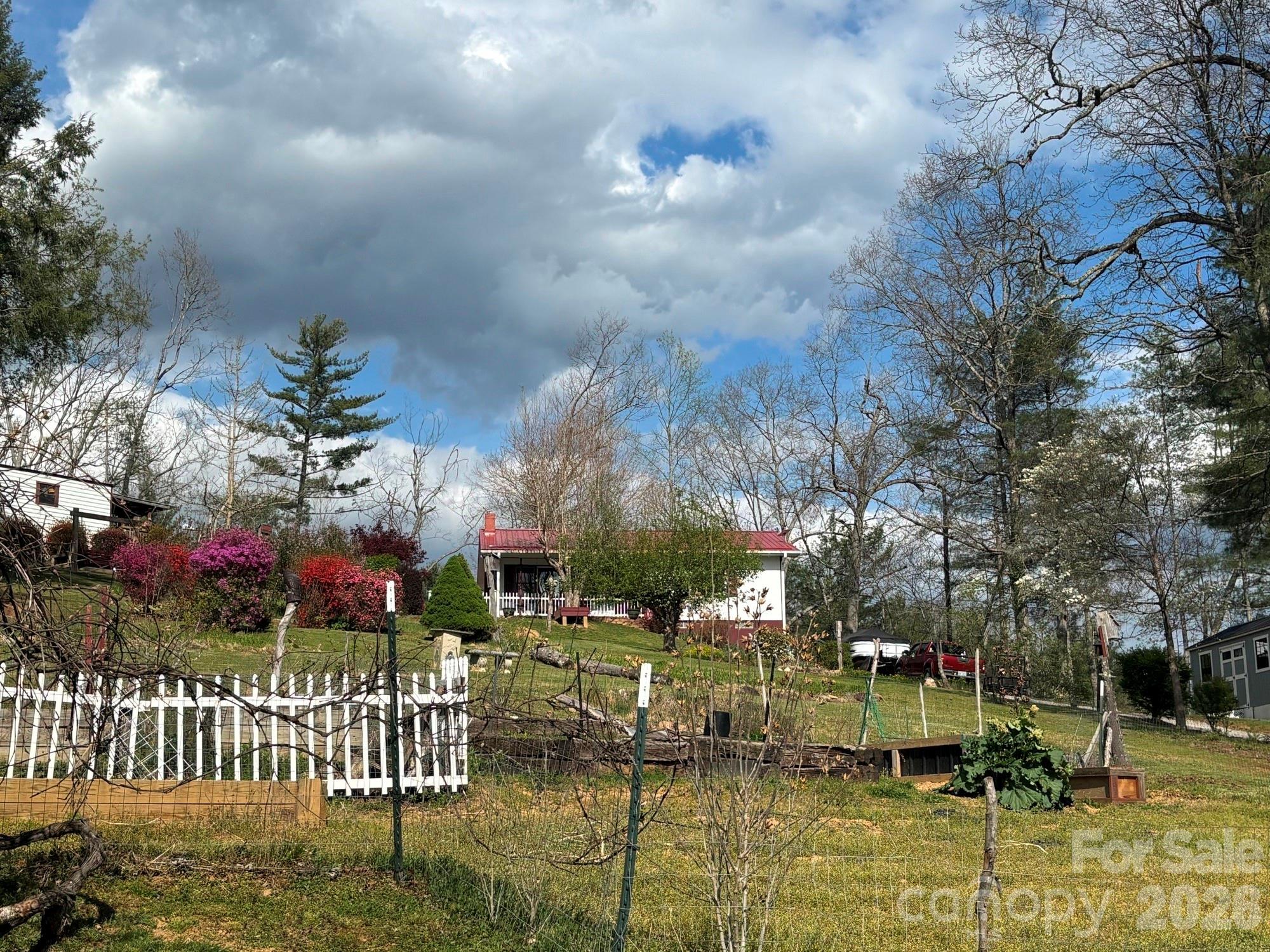 493 Franklintown Road Spruce Pine, NC 28777 - Photo 25 of 27 a view of houses with yard