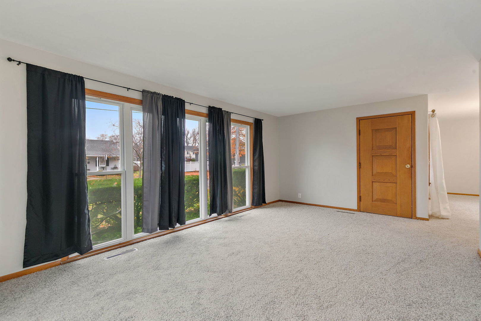 2 Adams Street East Dundee, IL 60118 - Photo 5 of 26 a view of an empty room with glass door