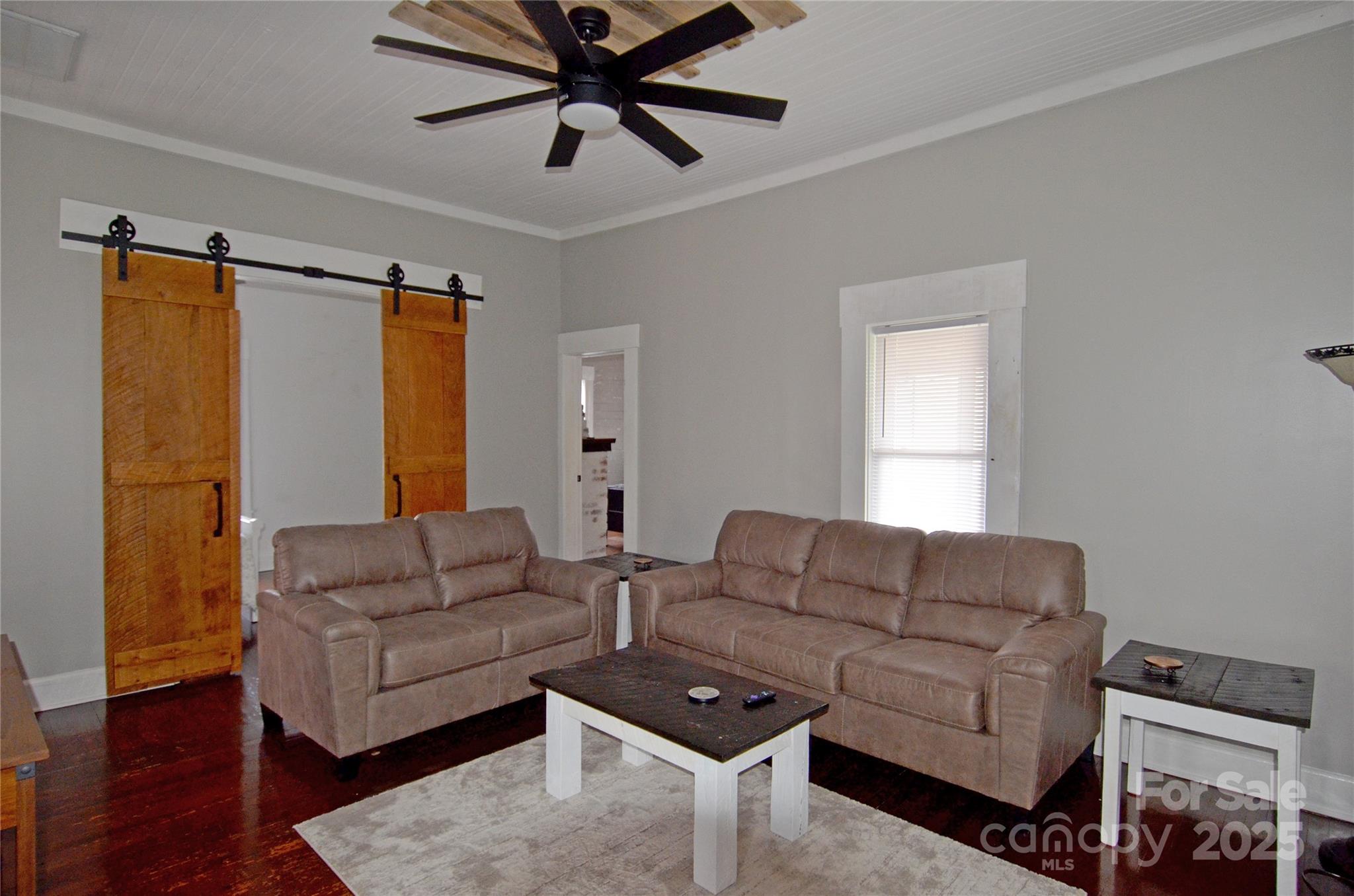 150 Hoyle Street, Unit 7 Marion, NC 28752 - Photo 13 of 21 a living room with furniture and a window