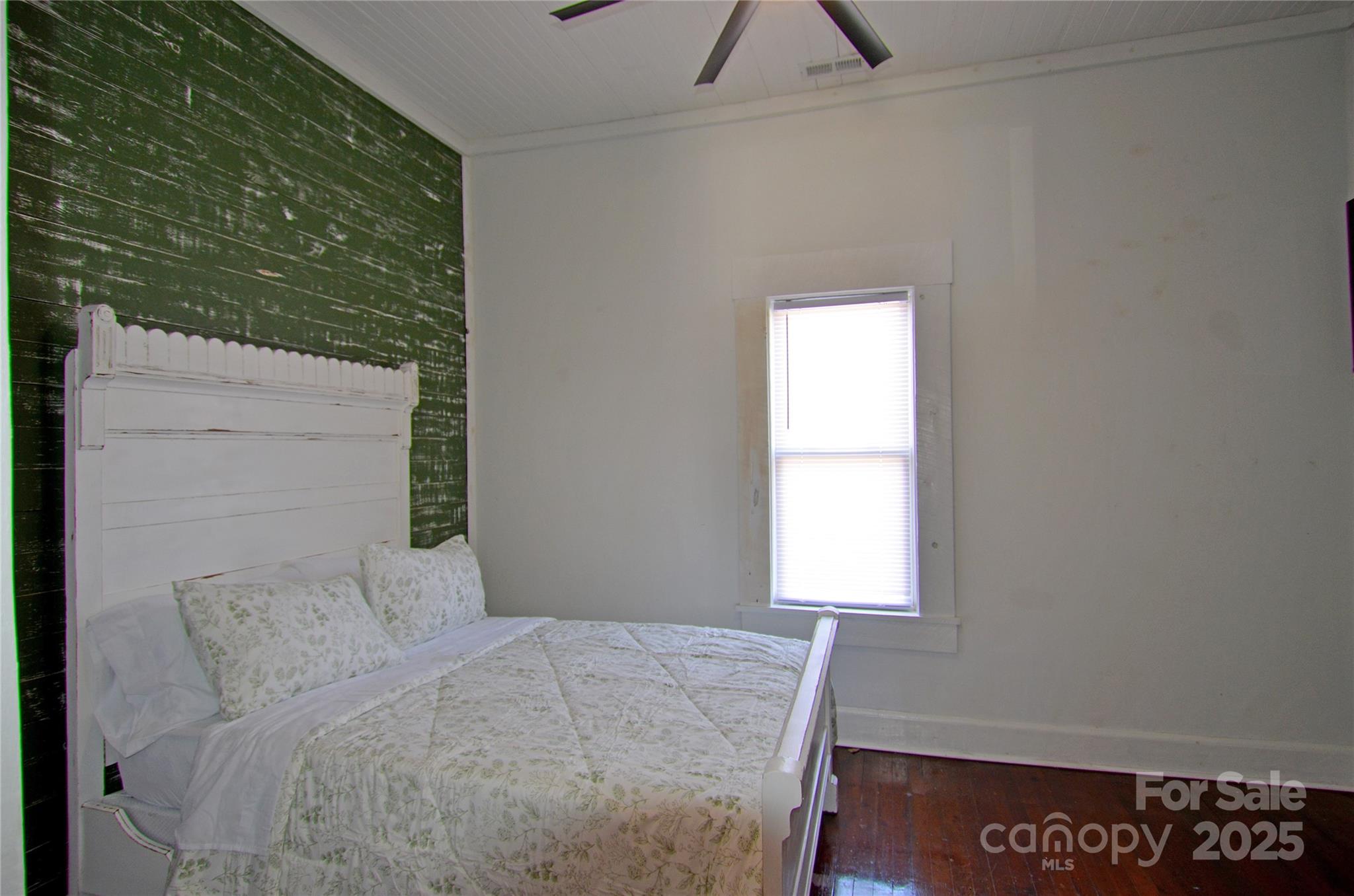 150 Hoyle Street, Unit 7 Marion, NC 28752 - Photo 16 of 21 a bedroom with a bed and a window