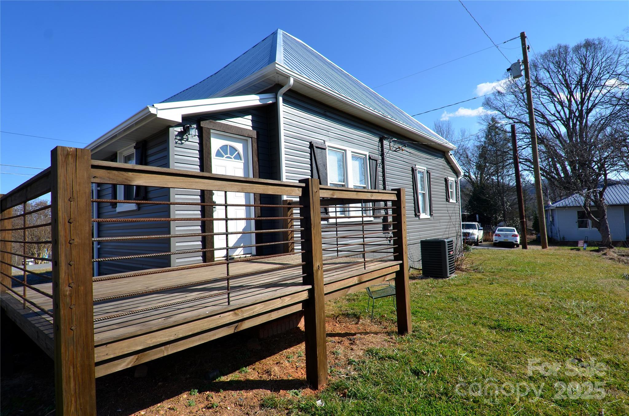 150 Hoyle Street, Unit 7 Marion, NC 28752 - Photo 4 of 21 a view of a house with a yard