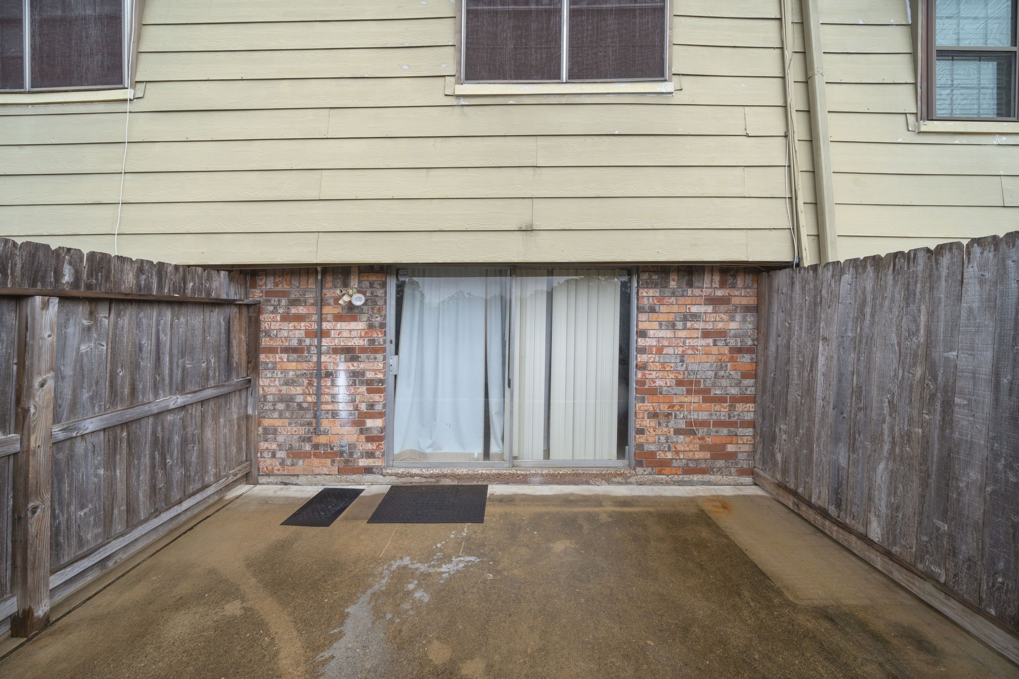 11550 Chimney Rock Road, Unit 521 Houston, TX 77035 - Photo 26 of 30 a front view of a house with a garage