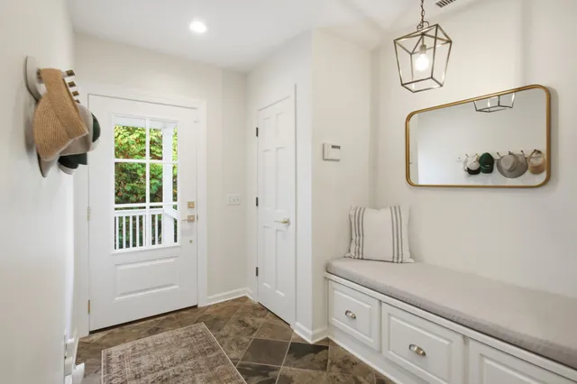 a view of swimming pool with chairs