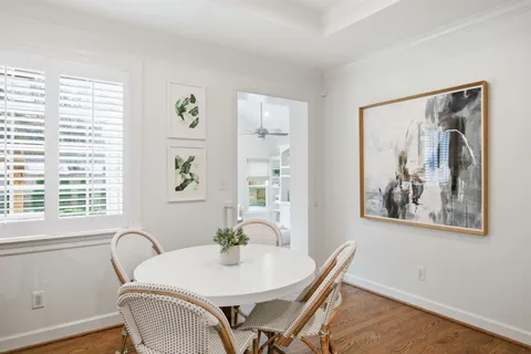 a kitchen with stainless steel appliances granite countertop a refrigerator a stove a sink and a refrigerator