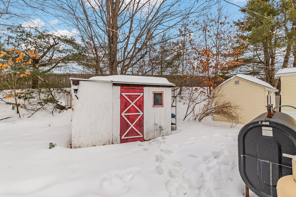 365 Main Street, Unit 3 Sturbridge, MA 01566 - Photo 18 of 20 a front view of a house with a yard
