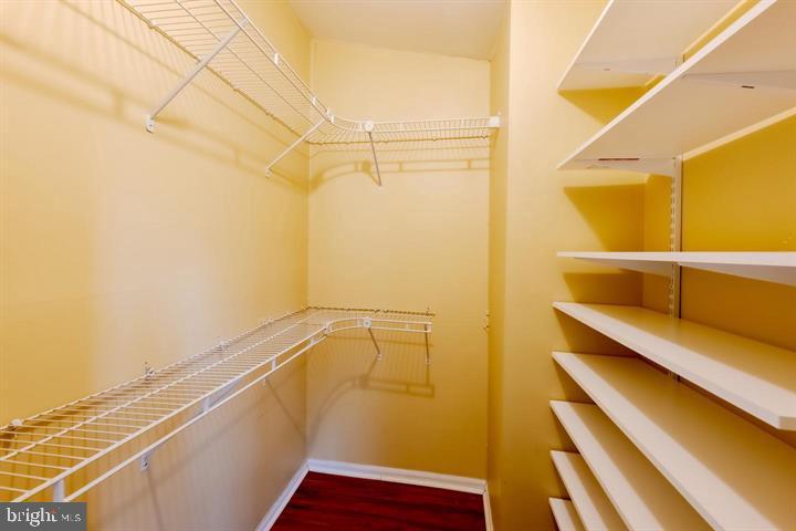 30 Wellspring Circle Owings Mills, MD 21117 - Photo 13 of 19 a view of a room with racks on the wall