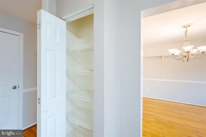 30 Wellspring Circle Owings Mills, MD 21117 - Photo 14 of 19 a view of a room with wooden floor and cabinet