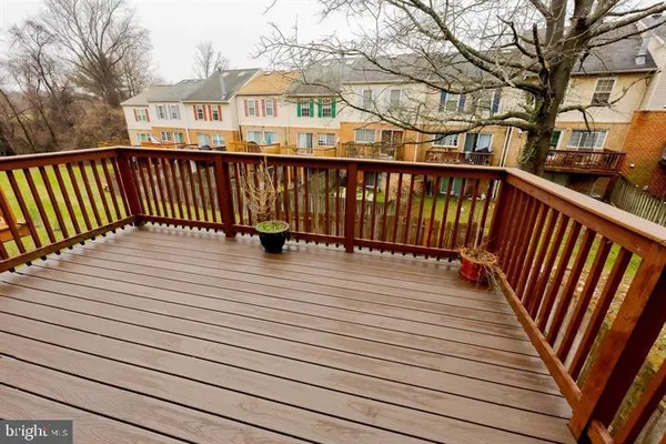 an outdoor view of garden with deck