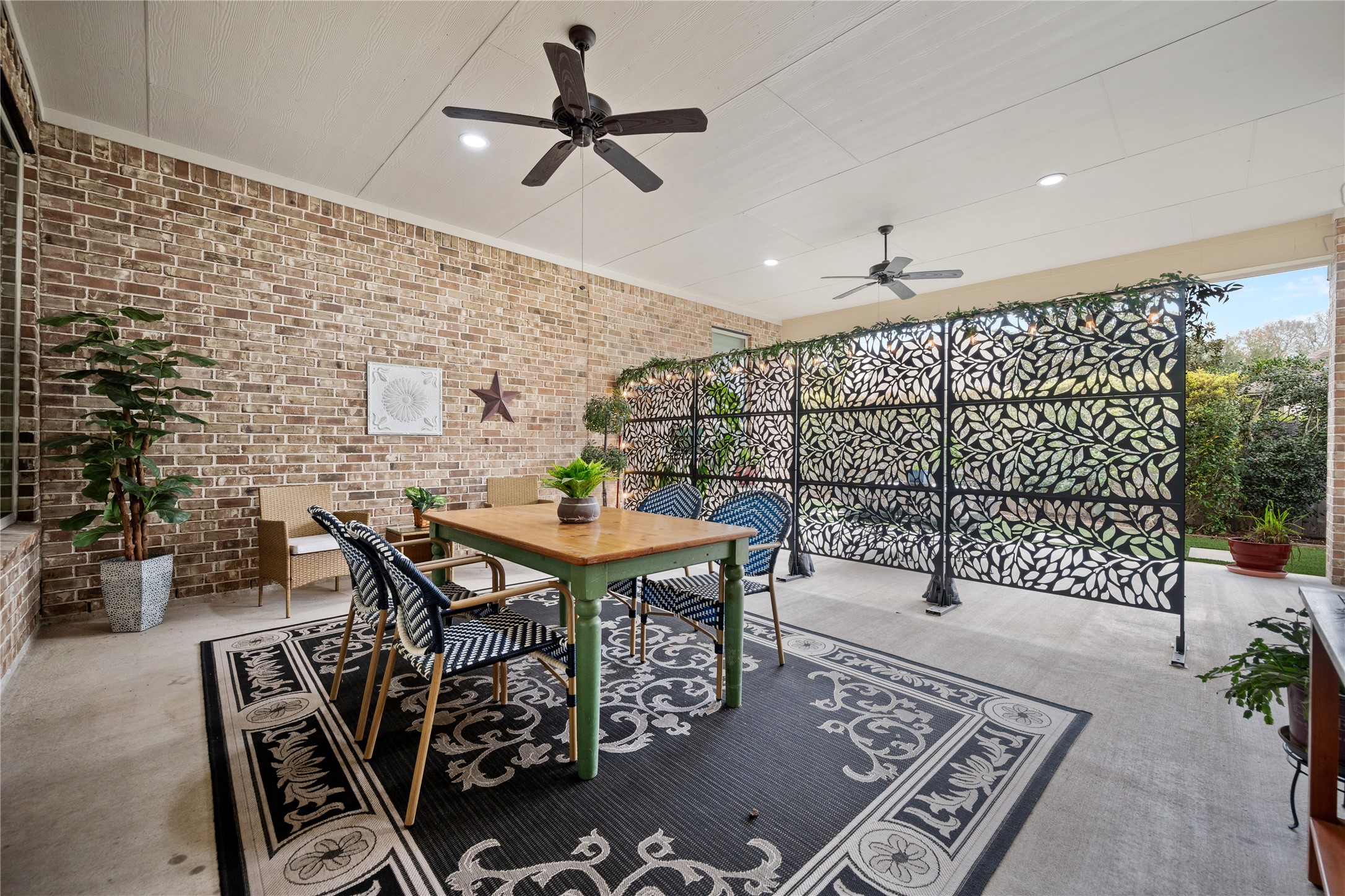 19911 Cullen Ridge Drive Porter, TX 77365 - Photo 19 of 42 a view of a dining room and livingroom with furniture