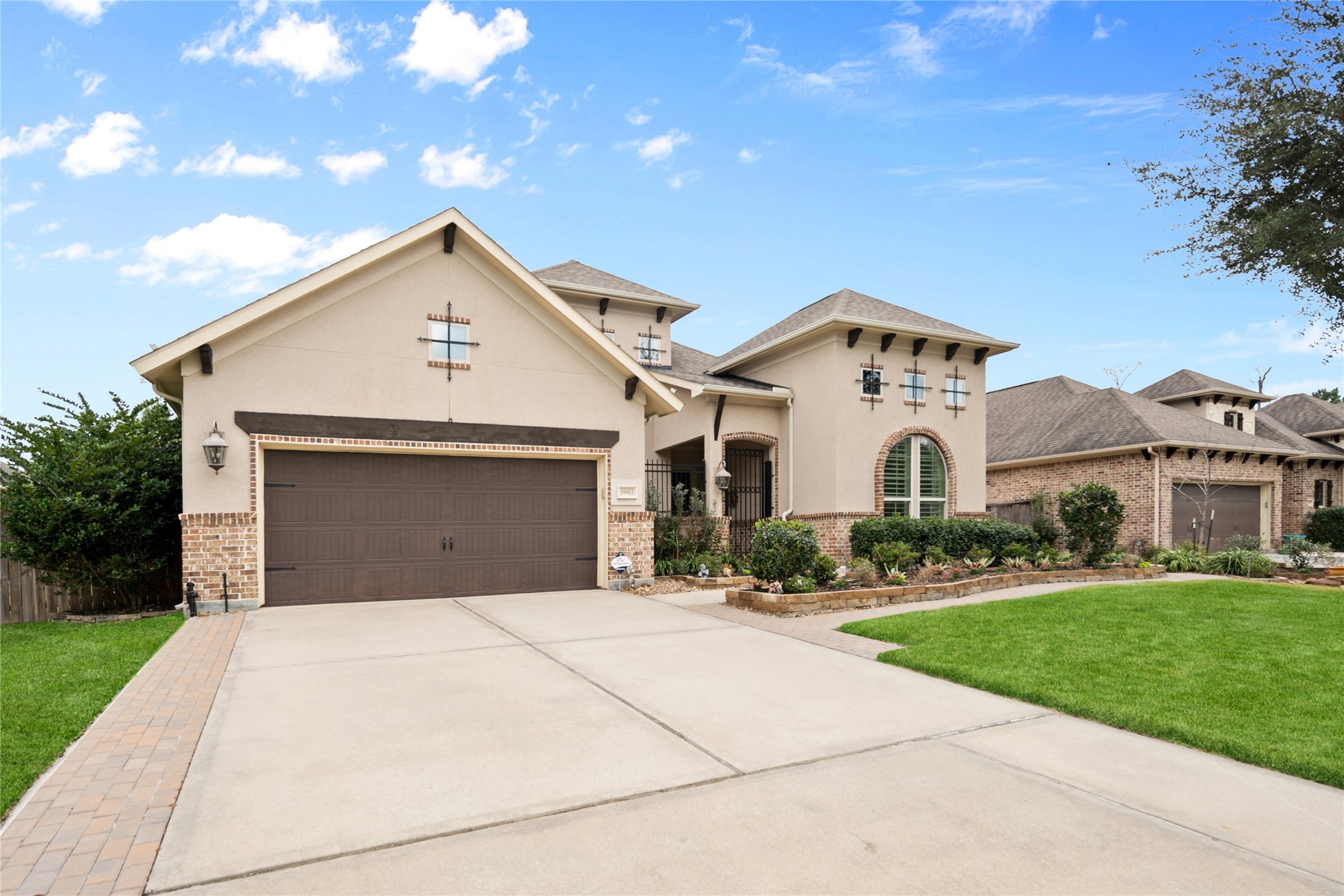 19911 Cullen Ridge Drive Porter, TX 77365 - Photo 2 of 42 a front view of a house with a yard