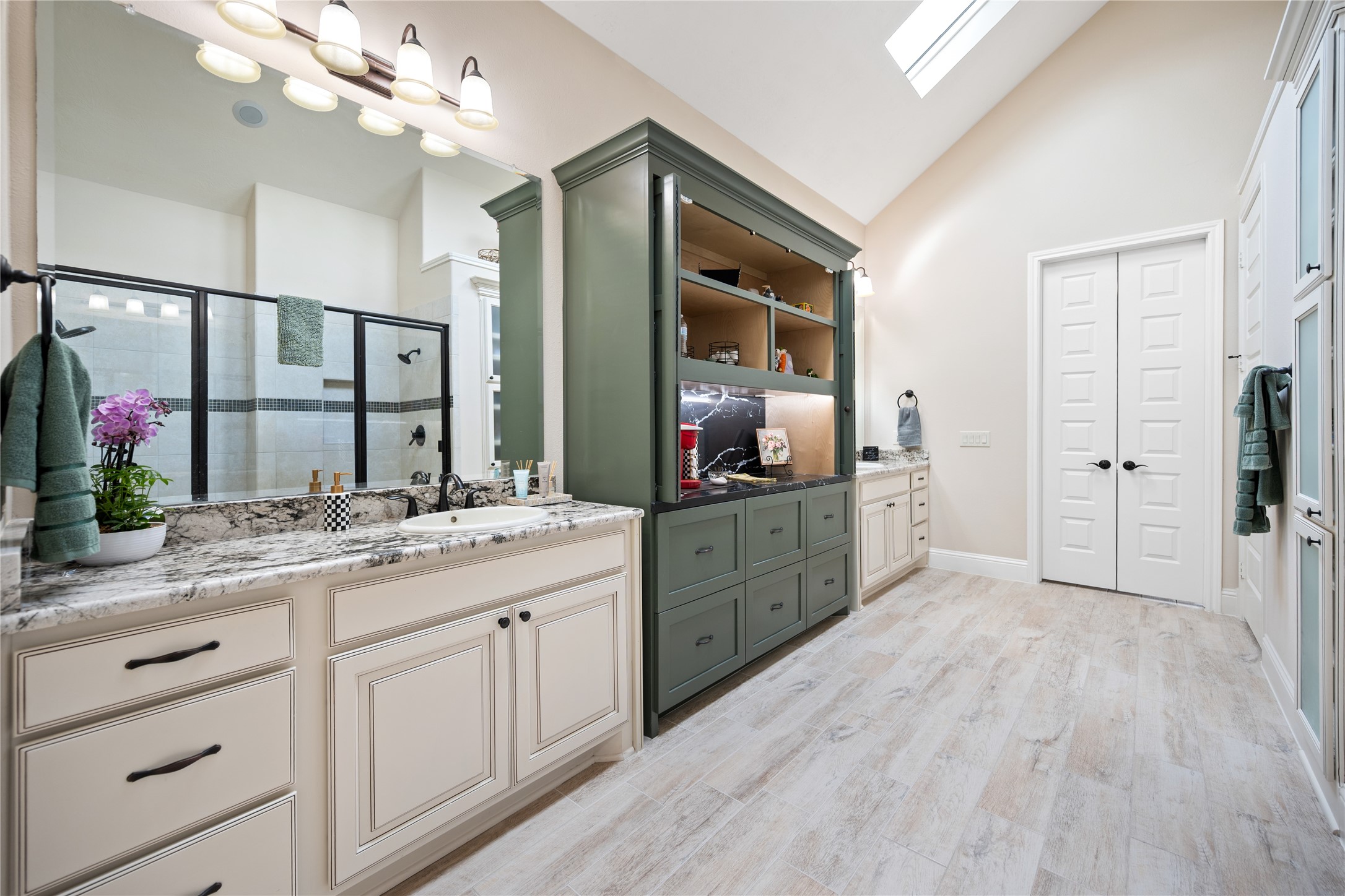 19911 Cullen Ridge Drive Porter, TX 77365 - Photo 22 of 42 a spacious bathroom with a granite countertop sink mirror and shower