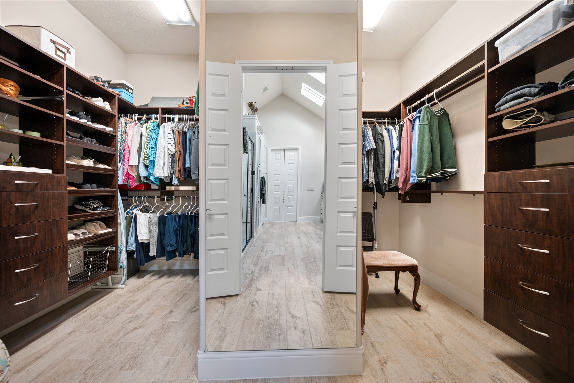19911 Cullen Ridge Drive Porter, TX 77365 - Photo 25 of 42 a view of walk in closet with clothes and shoes