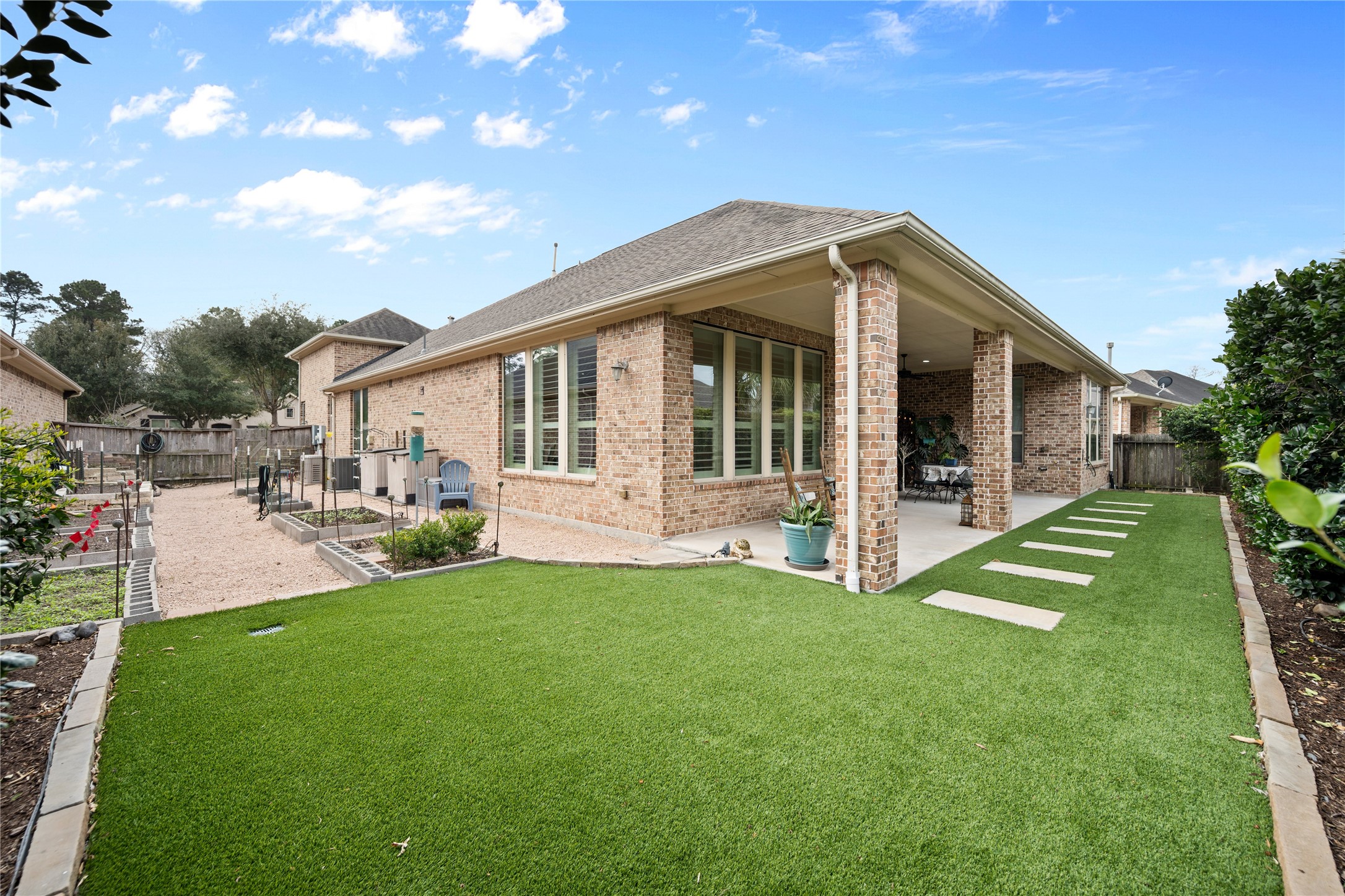 19911 Cullen Ridge Drive Porter, TX 77365 - Photo 35 of 42 a view of a house with a yard porch and sitting area